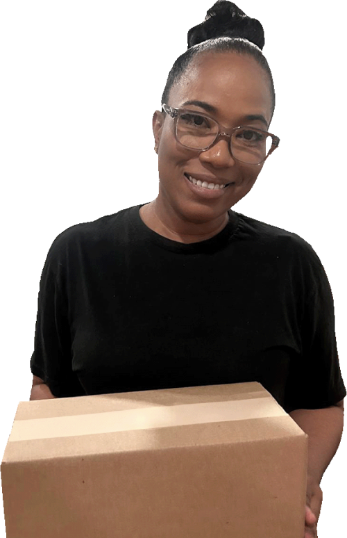 Woman in a Lansil Global shirt printing shipping labels